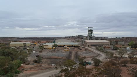flying up to reveal an old mine headframe in broken hill australia