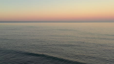 lone surfer in the water in la jolla california