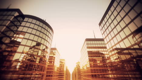 Infinite-skyscrapers-flight-through-animation-from-bird’s-eye-view.-The-business-and-offices-district-with-many-tall-modern-buildings.-Windows-reflect-the-cloudless-navy-blue-sky.-Loopable.-HD