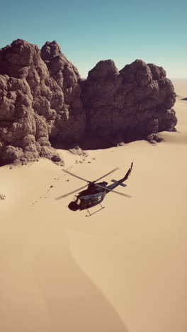 helicopter flying over desert rocks