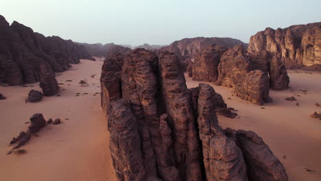 large sandstone rock formations in tassili n'ajjer national park at sunrise in djanet, algeria