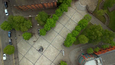 rising aerial video of writer's square and st anne's cathedral in the cathedral quarter in belfast, northern ireland, uk. filmed in 4k, 60fps and with rec709 color.