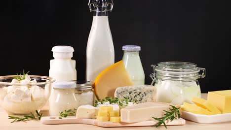 assorted dairy products on a black background