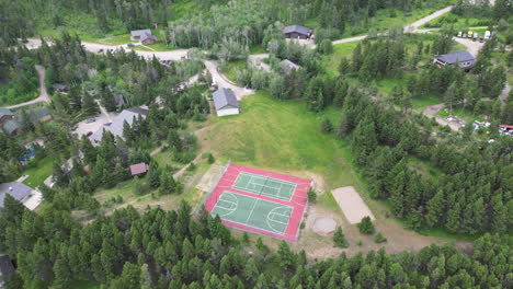 river and forest next to outdoor recreation area of summer camp