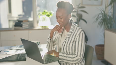 woman working on laptop in office