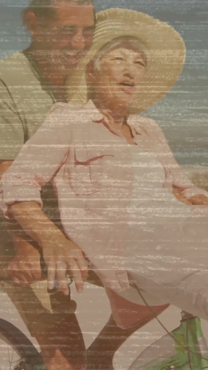 Vertical video: Seniors starting beach ride man steering bike woman reclining travel grain crossing