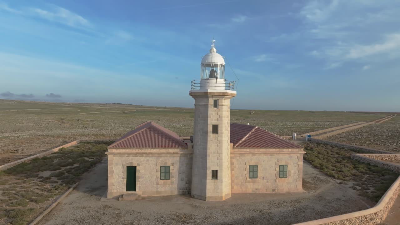 Punta Nati Lighthouse Menorca island Spain building landmark active aid to navigation, aerial drone