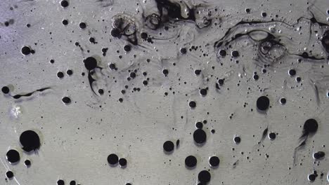 ink blotted on metal surface