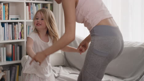 happy family dancing teenage girl having fun dance with little sister at home celebrating exciting weekend together 4k