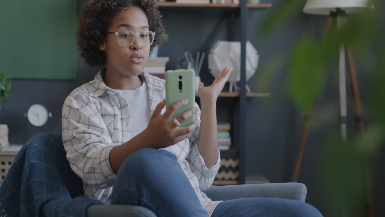 Woman having a video call at home