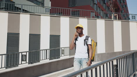 delivery person talking on phone