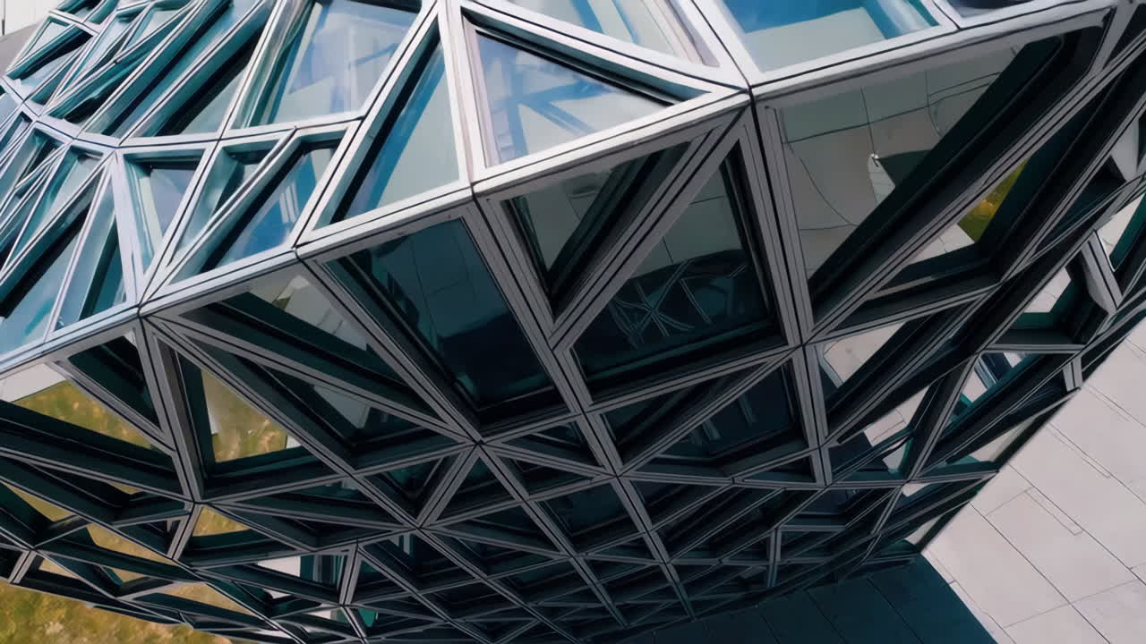 Modern Architectural Facade with Geometric Glass Triangles