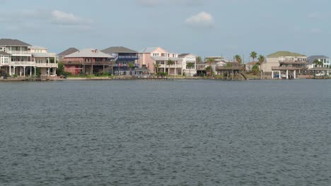 Aerial-of-affluent-Lakefront-homes-in-near-Galveston,-Texas