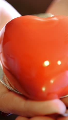 close-up of a heart-shaped dessert
