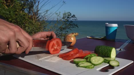 preparing a salad by the seaside