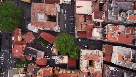 aerial top down rising revealing frascati town centre, italy