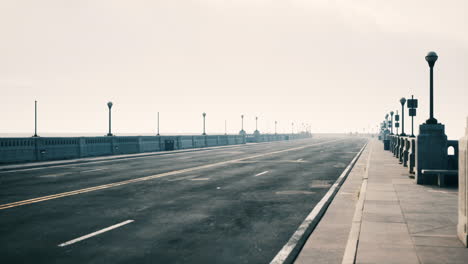 empty bridge road at dawn