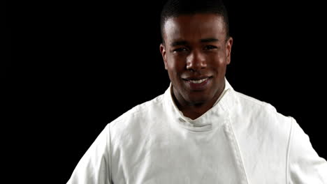 fencing player holding helmet and showing thumb up