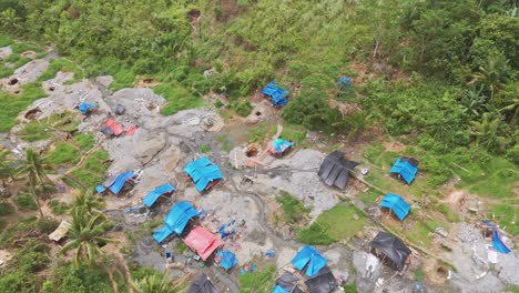 lots of unregulated dangerous mining camps destroy rice paddies as gold rush fever hits the area.