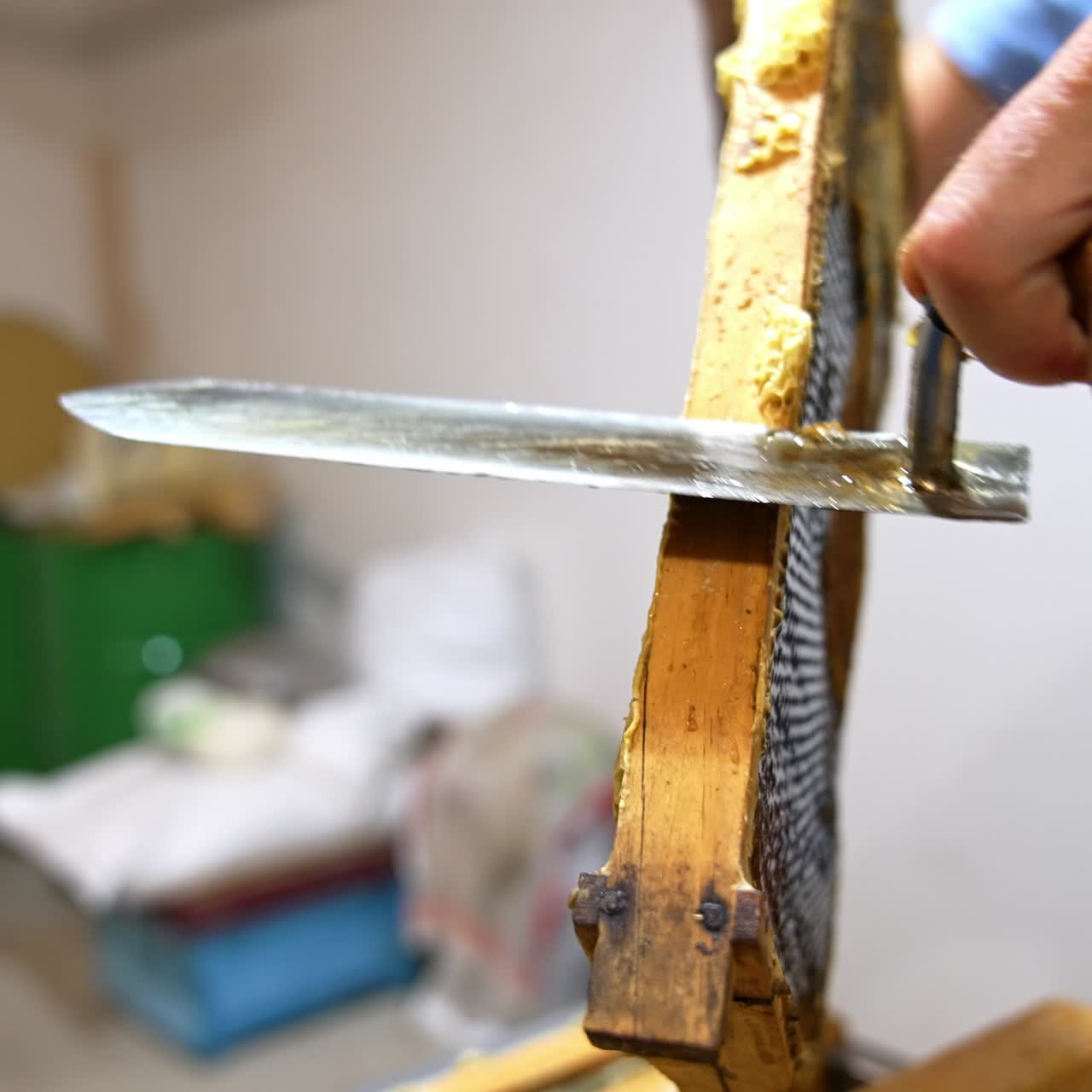 Wooden beehive wax harvesting. Beeswax organic honey farming