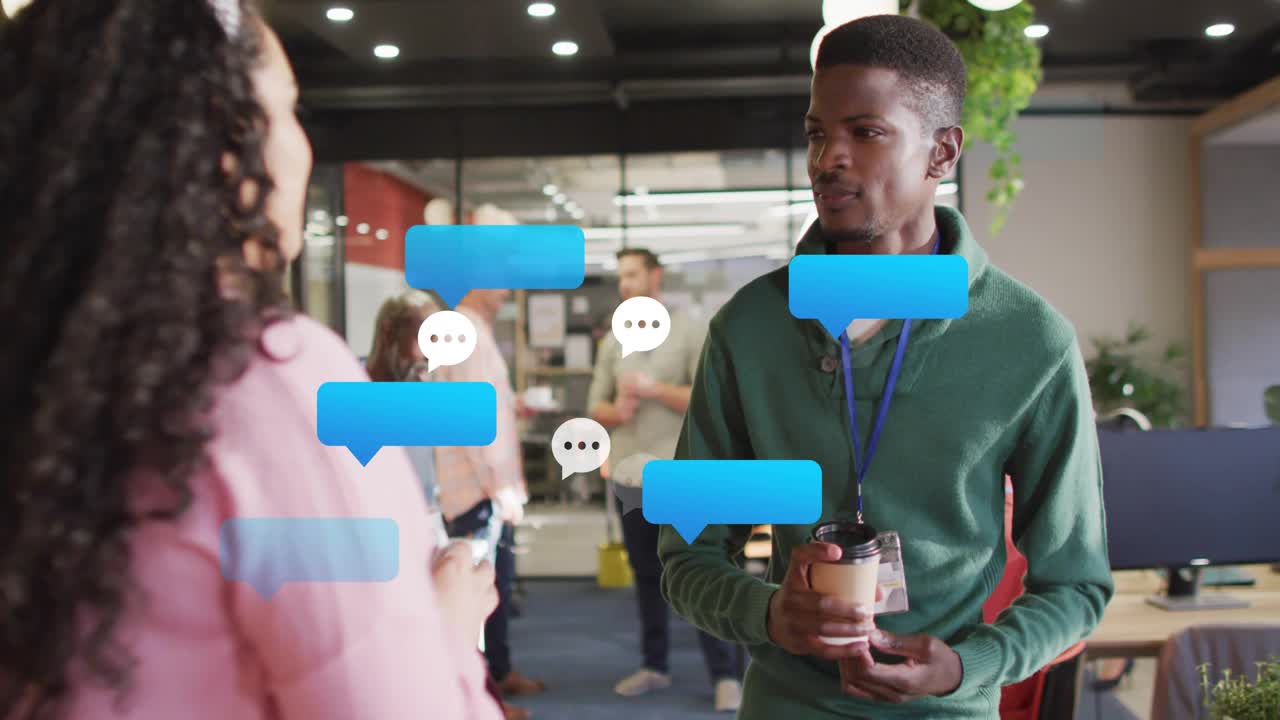 Office break woman in pink blazer starting chat sparking blue bubbles on coffee cups man smiling