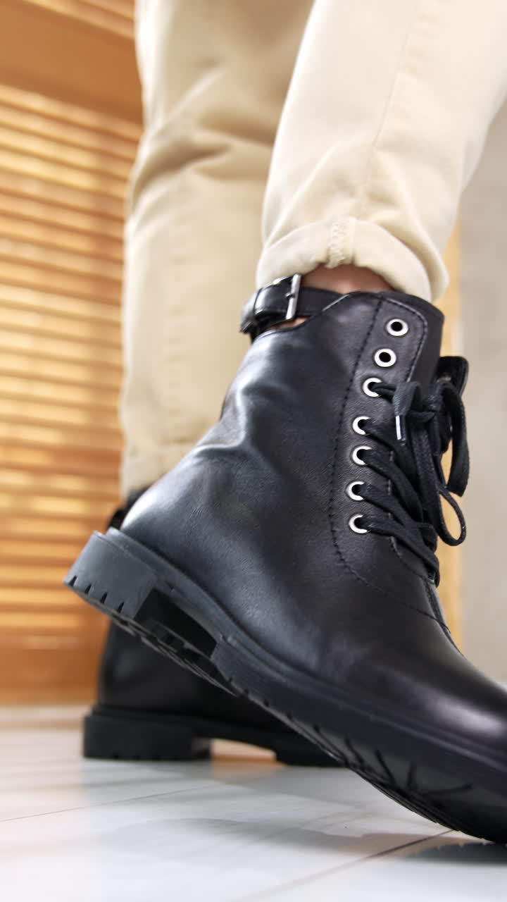 Stylish woman footwear demonstration. Lifestyle shoe boutique. Vertical video