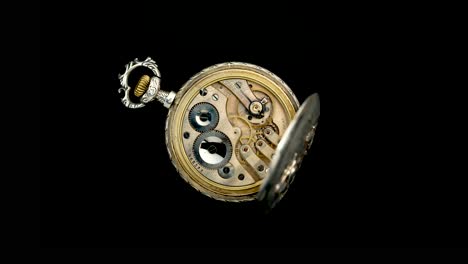 open vintage pocket watch, close-up