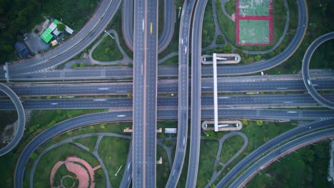 4k : aerial hyperlapse drone shot of fast moving highway road. timelapse of cars