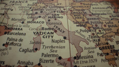 close-up of a vintage world map focusing on italy and surrounding countries