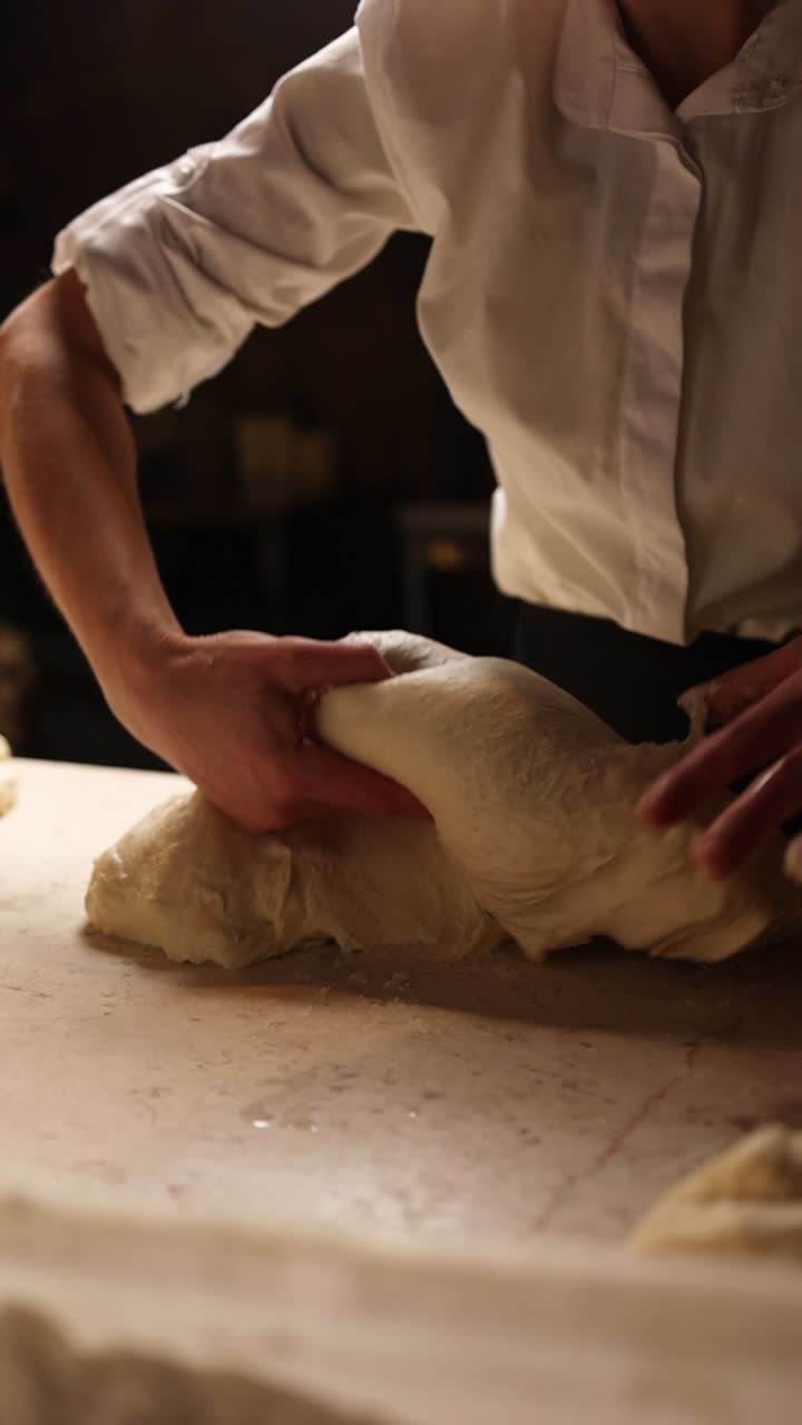 Baker kneading dough