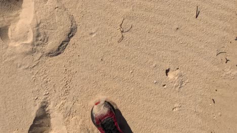 footsteps on sandy beach in nambucca, nsw