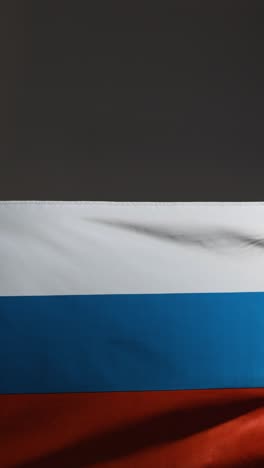 Vertical-Tracking-Shot-of-Russian-Flag-