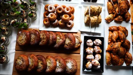 Top-down-view-of-savory-and-sweetened-bakery-goods-on-table,-Czechia