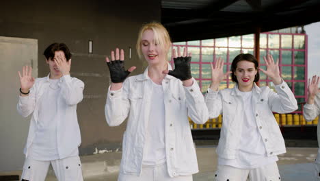 Group-of-dancers-in-white-outfit-starting-the-dance-rehearsal