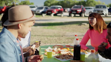 friends enjoying an outdoor picnic