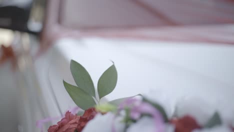 flower bouquet to decorate the wedding car - slow motion