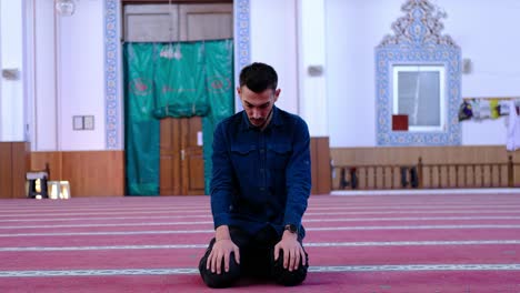 youth turning his head in the mosque 1