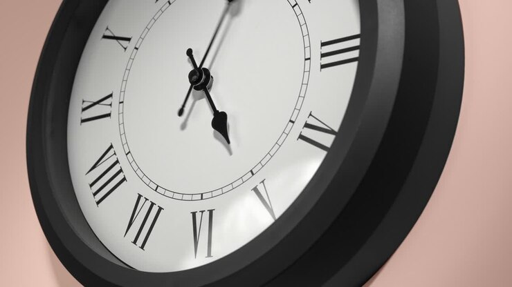 Latin Clock Face on Cream Beige Wall