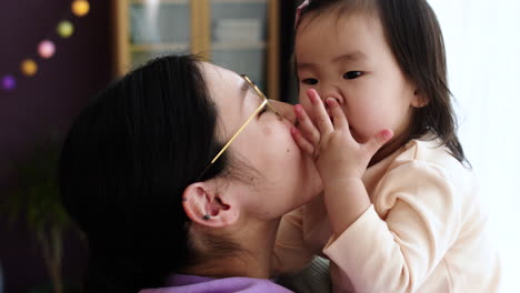 asian mother with her baby