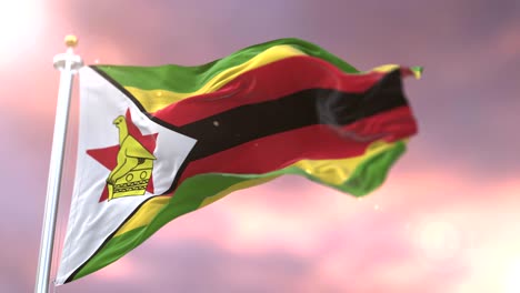 Zimbabwe flag waving at wind in slow at sunset, loop