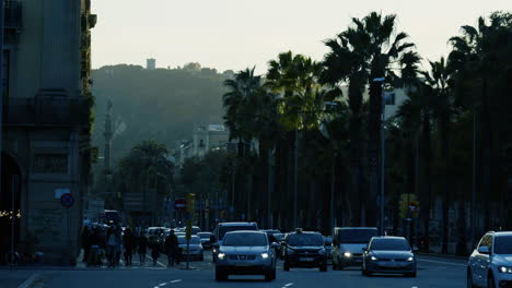 city street scene in barcelona at sunset