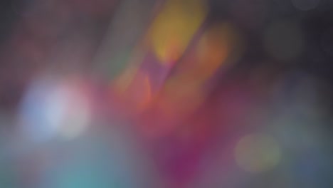 los colores de neón de moda son luces desfocalizadas brillantes festivas. bokeh azul, amarillo y púrpura 4k. imágenes de superposición abstracta con estilo perfecto. año nuevo de navidad parpadeando con un fondo colorido parpadeante.