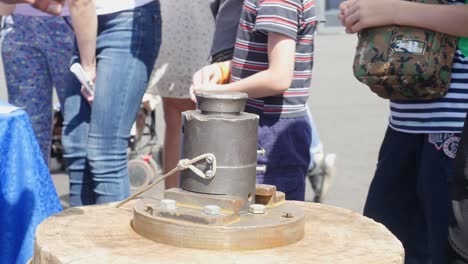 metalworking demonstration at a festival