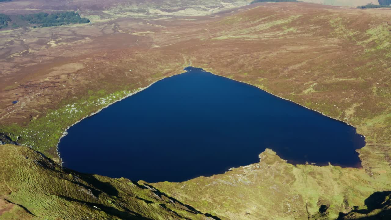 Aerial Shot of Lough Ouler, Wicklow’s Iconic Heart Shaped Mountain Lake on a Sunny Day