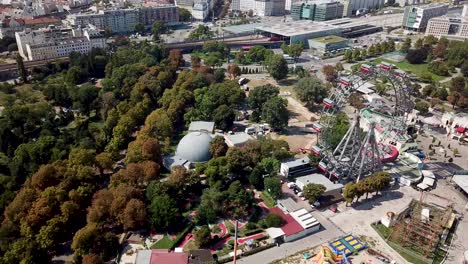 aerial view of amusement park and cityscape in vienna, austria