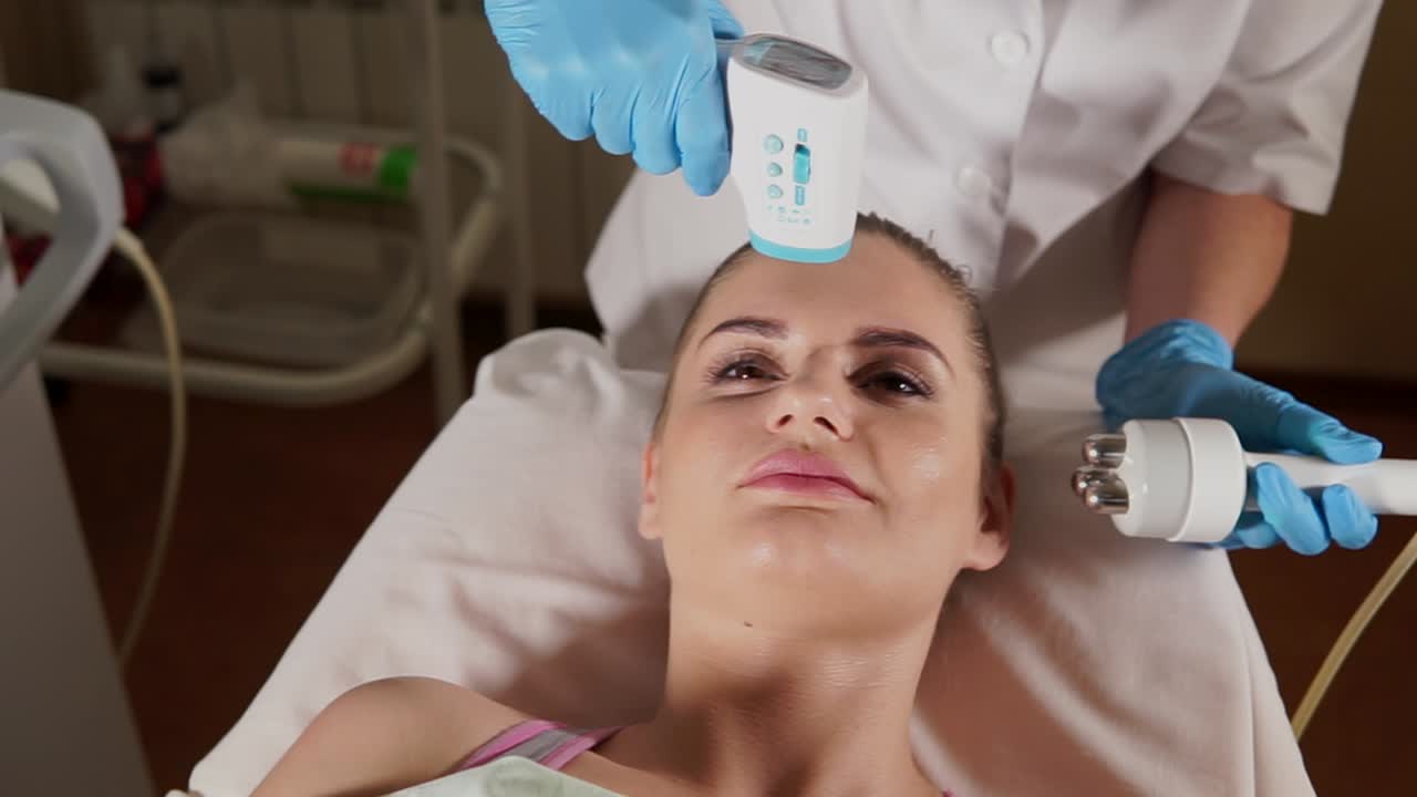 Woman receiving facial treatment in a spa or clinic
