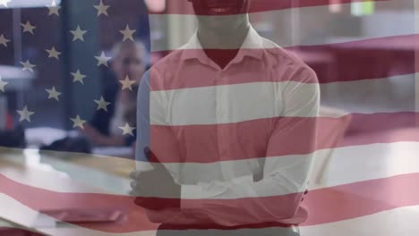 Animation-of-flag-of-united-states-of-america-over-smiling-african-american-man