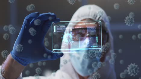 Animation-of-virus-cells-and-digital-interface-over-male-doctor-wearing-face-mask