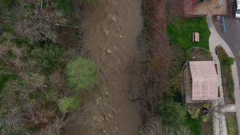 aerial view of small town and creek in oregon