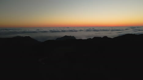 beautiful horizon at sunrise with sea of clouds in madeira island, portugal